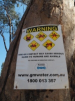 Warning signs are littered along the side of the Murray.